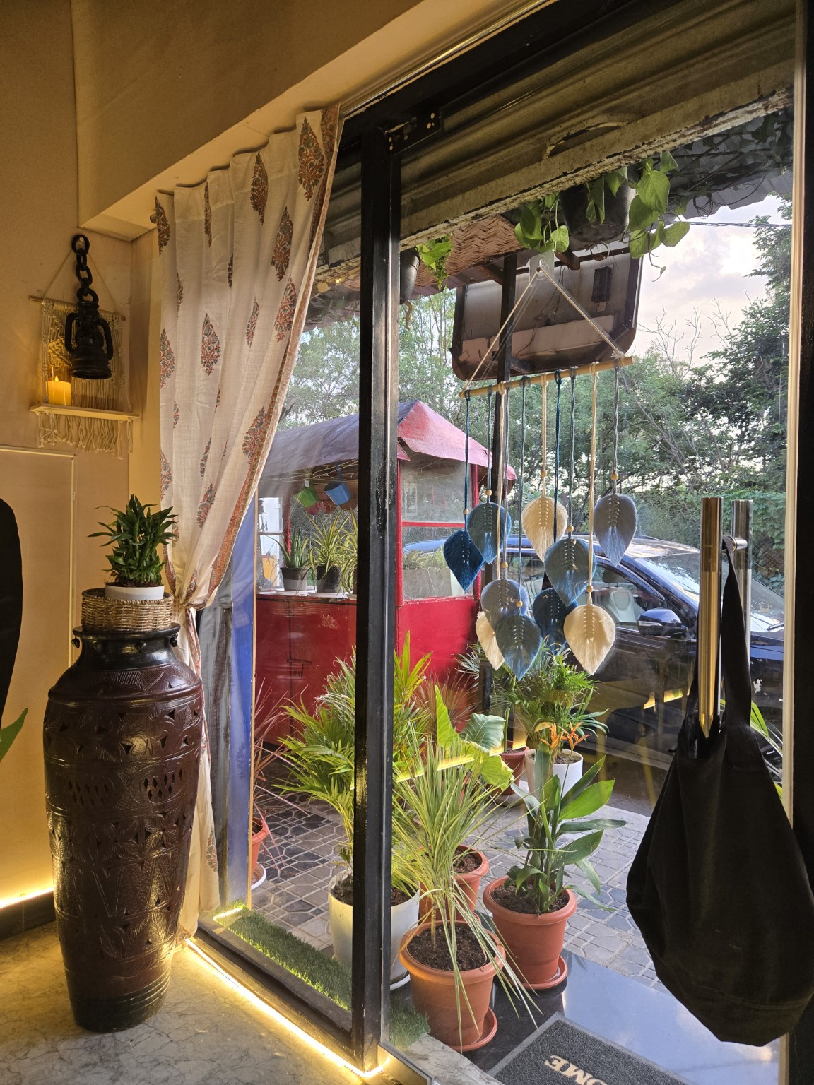 LiLTWO café entrance with plants